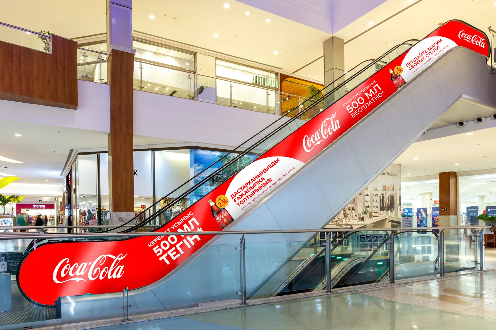 Coca-Cola escalator branding wrap in a mall