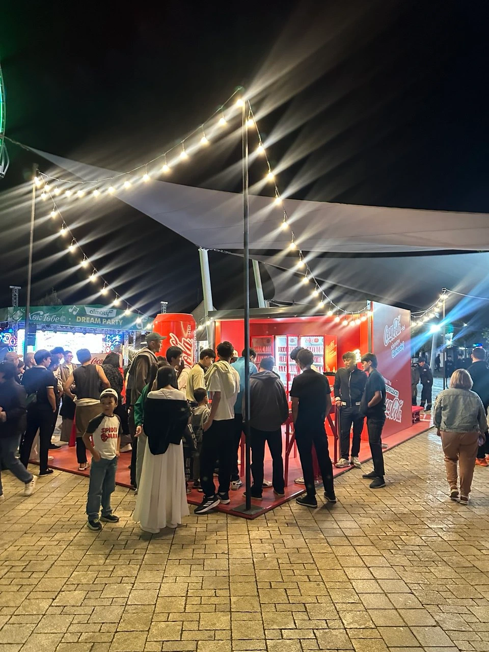 Visitors at the Coca-Cola promo zone